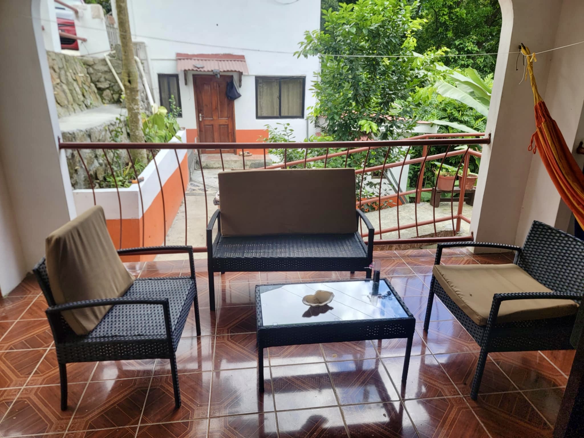Terrace with seating and hammock